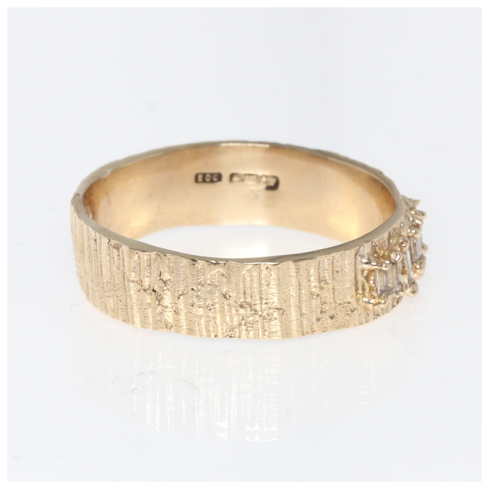 Load image into Gallery viewer, Gold ring with textured band on a white background