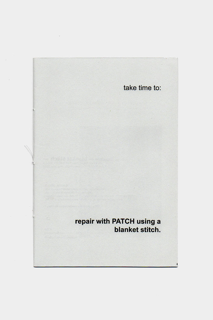 Load image into Gallery viewer, Garcia Bello Zine: Repair with patch using a blanket stitch